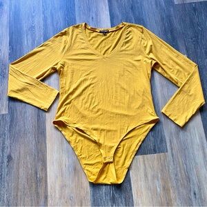 NWOT Yellow Body Suit Long Sleeves V Neck